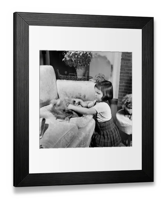 Framed Print : Caroline, little daughter of the Earl and Countess Ranfurly is making a start