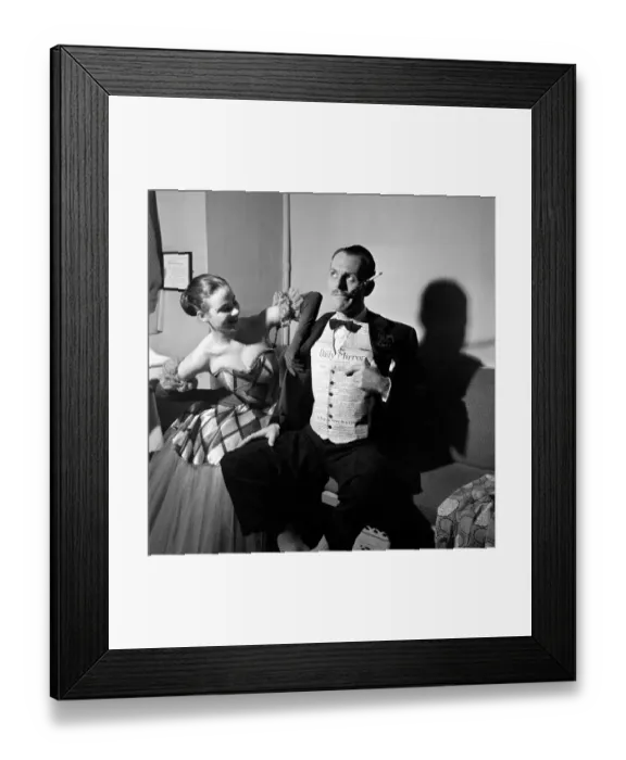 Framed Print : Terry Thomas tries out the Daily Mirror designed waistcoat at the Palladium Theatre where