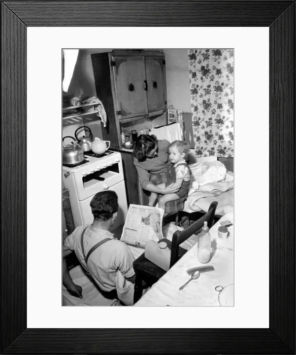 Framed Print : In Paddington three families share a terrace house. The two bedroom house means that one Framed Print : In Paddington three families share a terrace house. The two bedroom house means that one