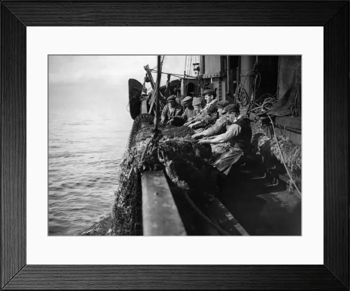 Framed Print : North East Coast Trawlermen heave up the nets in North Sea