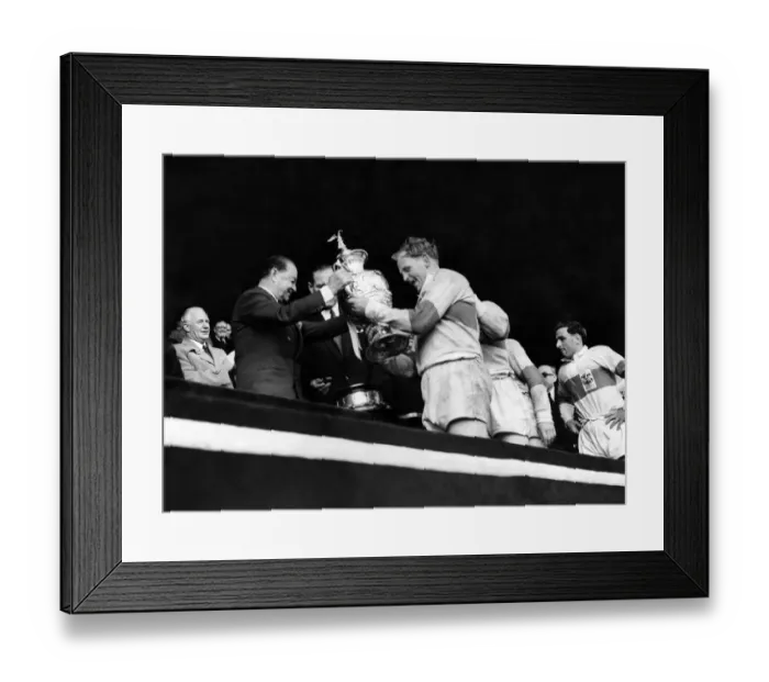 Framed Print : Rugby League Cup Final 1956. St. Helens v. Halifax. Prescott of St. Helens receives cup Framed Print : Rugby League Cup Final 1956. St. Helens v. Halifax. Prescott of St. Helens receives cup