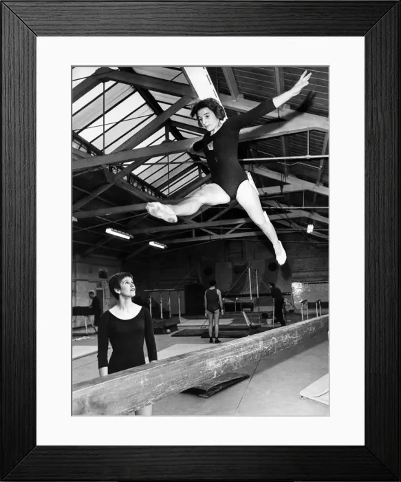 Framed Print : Margaret Bell does a splits jump, Mary Prestidge watches. September 1968 P011462 Framed Print : Margaret Bell does a splits jump, Mary Prestidge watches. September 1968 P011462