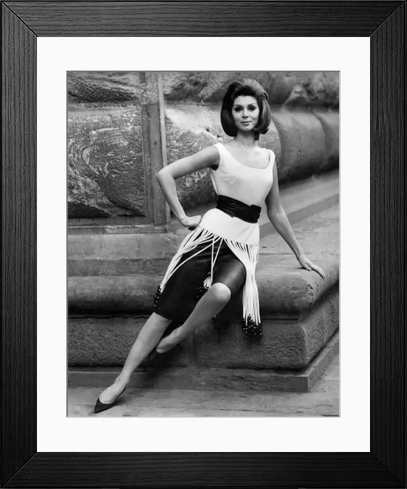 Framed Print : How to be a well-dressed hostess. Wear black silk knee-length pants under a white tunic