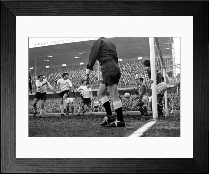 Framed Print : Derby v. Nottingham Forest. Near thing for Forest as this ball cleaned 0  /  6 the live then