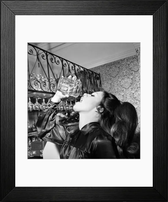 Framed Print : Woman drinking a pint of beer in her local pub November 1969 Z11012 Framed Print : Woman drinking a pint of beer in her local pub November 1969 Z11012