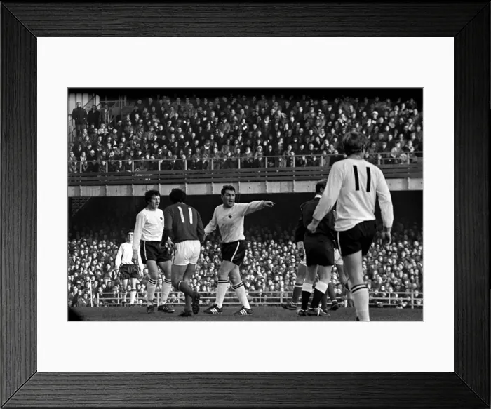 Framed Print : Derby v. Nottingham Forest. Dave Mackay not seeing eye to eye with the ref