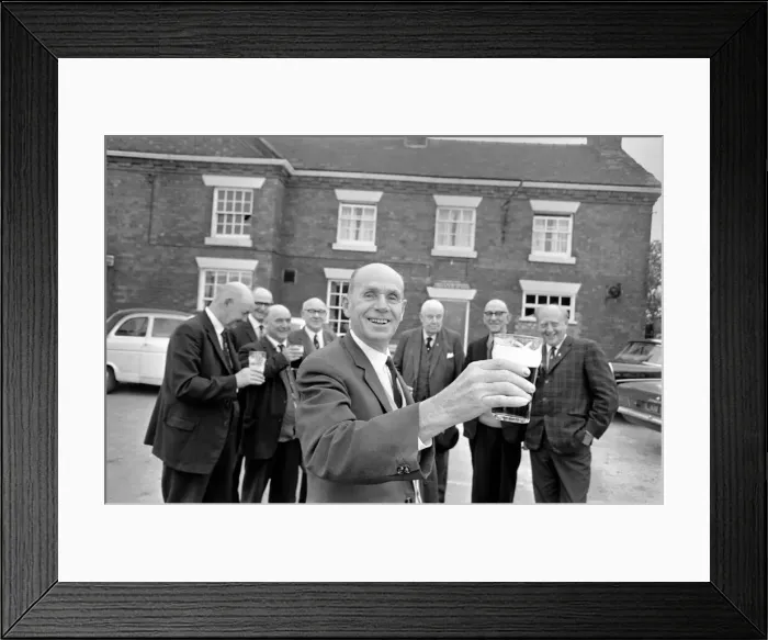 Framed Print : Secretary of the Bald Head d Mens Club Vic Hinds with some of his members outside