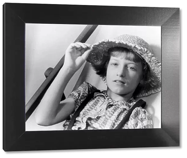 Young girl wearing straw hat Circa 1945 P044501