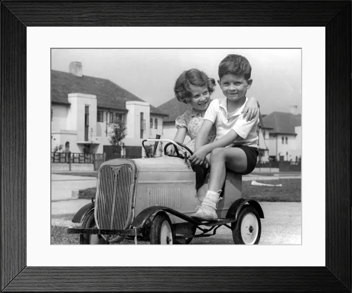 Framed Print : Two children playing with toy car. c. 1945 P044497 Framed Print : Two children playing with toy car. c. 1945 P044497