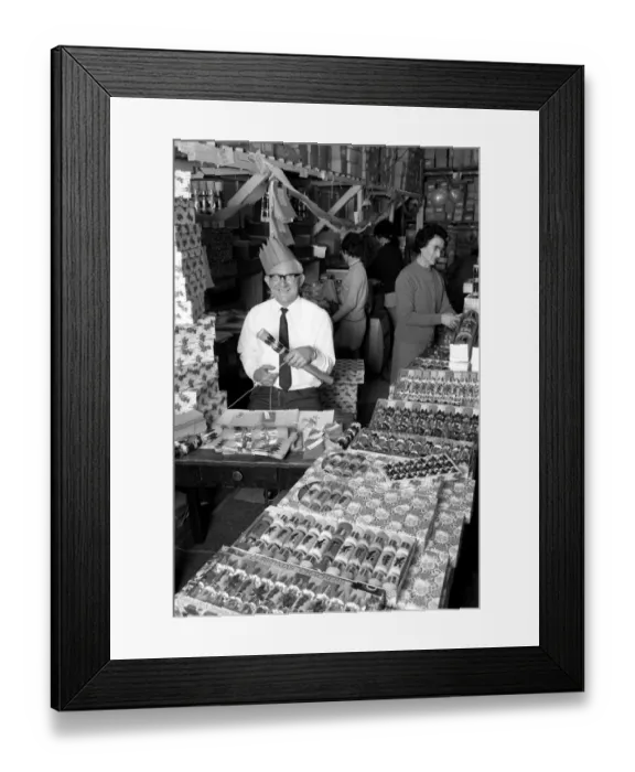 Framed Print : While most people today are trying to forget Christmas, workers at Napier Novelty Company