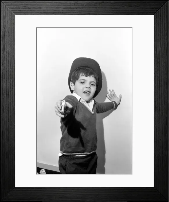 Framed Print : Little abandoned boy who calls himself George Mason settles down in a children