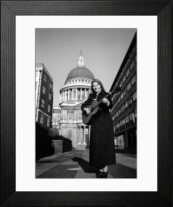 Framed Print : Entertainment: Music. Folk singer Suzanne Harris sang to a lunch time audience in St