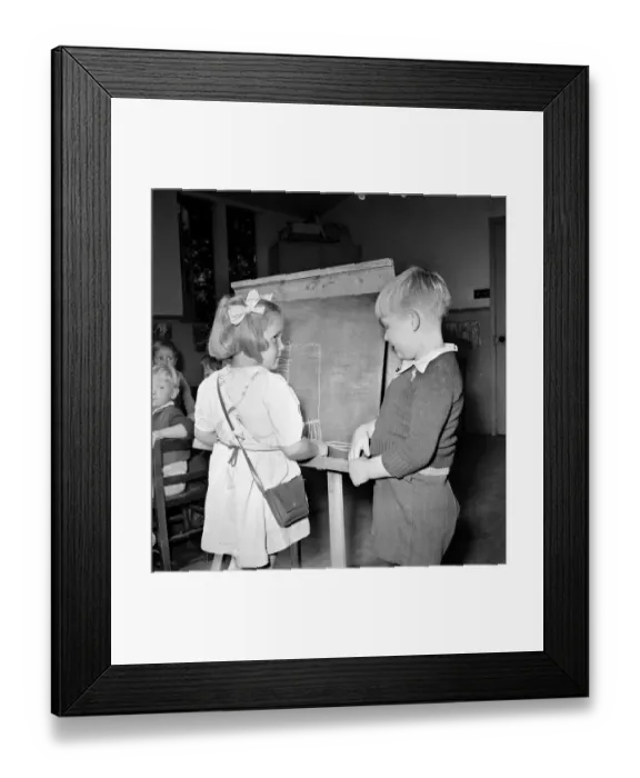 Framed Print : A boy and girl seen here painting at the Barley Park Day Nursery in Leeds Framed Print : A boy and girl seen here painting at the Barley Park Day Nursery in Leeds