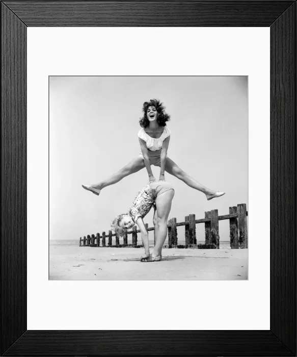 Framed Print : Beach Glamour: Having holiday fun in the sun at Minnis Bay near Margate, Kent Framed Print : Beach Glamour: Having holiday fun in the sun at Minnis Bay near Margate, Kent