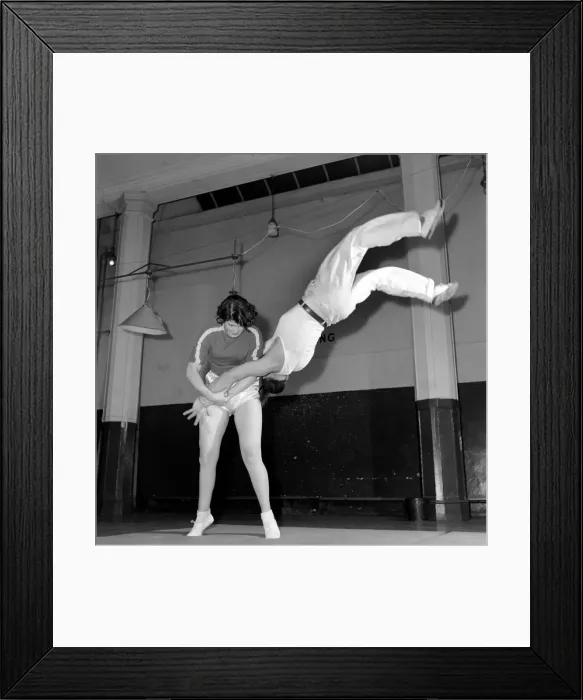 Framed Print : Ruby miller (16) being trained by Mickey Wood in judo, self defence and flame swallowing