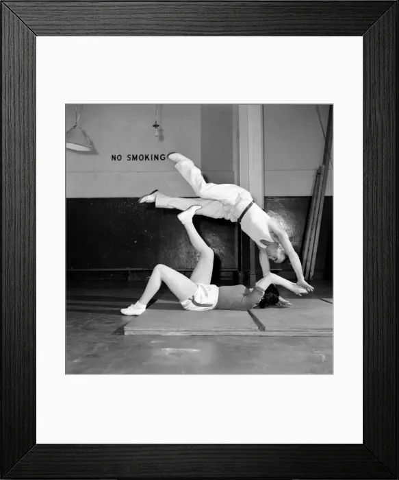 Framed Print : Ruby miller (16) being trained by Mickey Wood in judo, self defence and flame swallowing