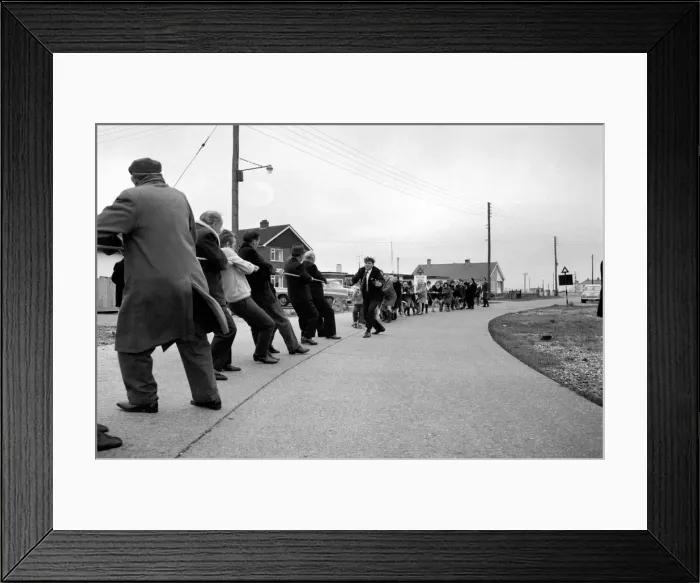 Framed Print : The annual Tug O war battle of the sexes took place yesterday outside the Pilot Pub Framed Print : The annual Tug O war battle of the sexes took place yesterday outside the Pilot Pub