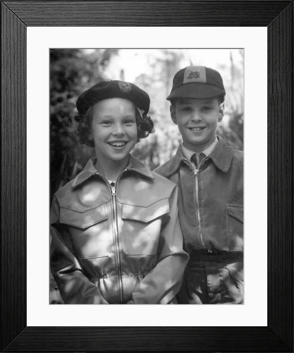 Framed Print : Young boy and girl together, both wearing hats Circa 1945 P044432 Framed Print : Young boy and girl together, both wearing hats Circa 1945 P044432