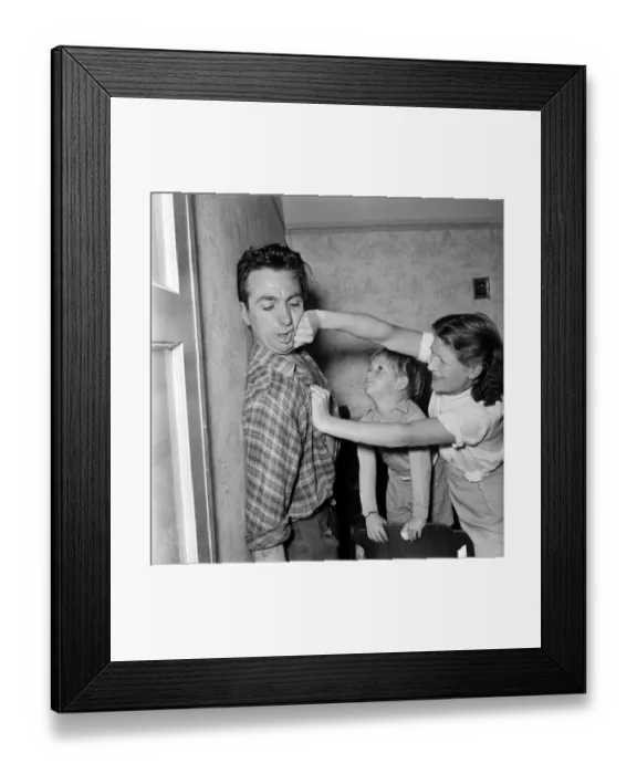 Framed Print : Familys: Voilence. Stuntman Steve Donohue seen here having a Mock Fight with his daughter Framed Print : Familys: Voilence. Stuntman Steve Donohue seen here having a Mock Fight with his daughter