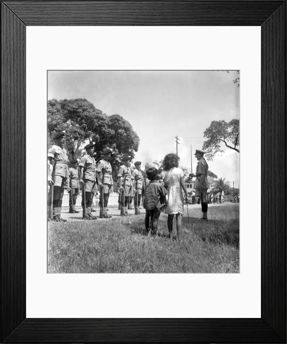 Framed Print : British soldiers marching in Georgetown, British Guiana watched by local citizens Framed Print : British soldiers marching in Georgetown, British Guiana watched by local citizens