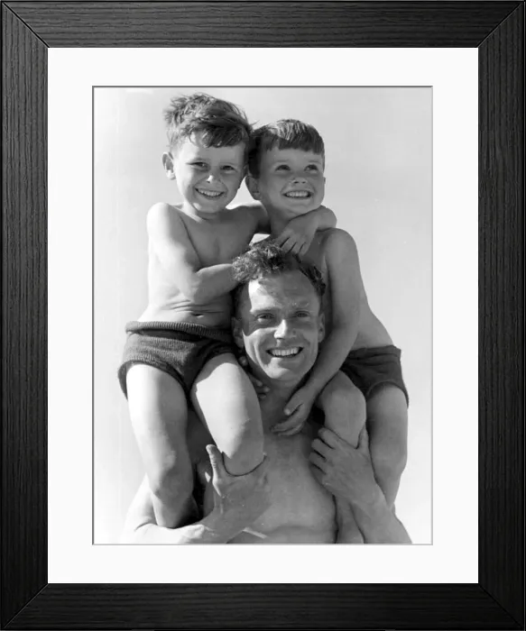Framed Print : A father with his two young sons sitting on his shoulder Circa 1945 P044436 Framed Print : A father with his two young sons sitting on his shoulder Circa 1945 P044436