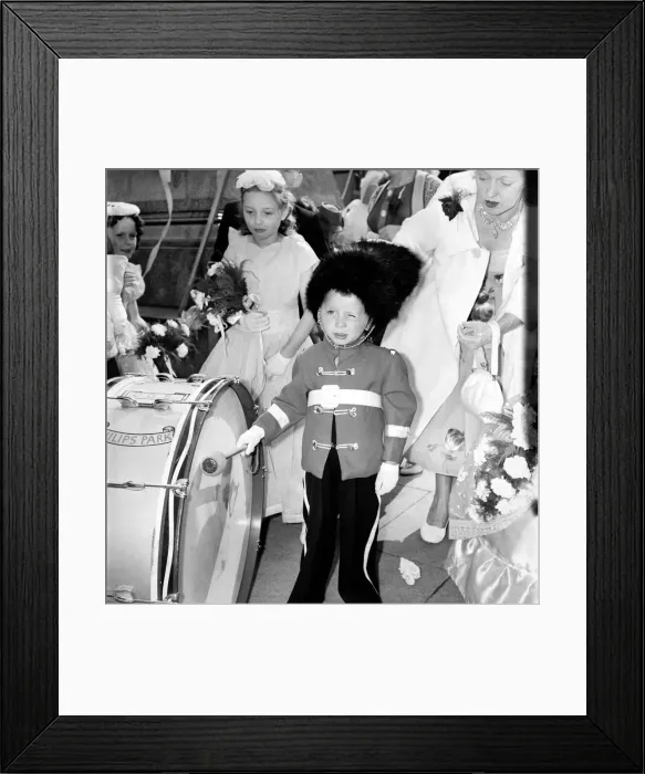 Framed Print : A small boy in a soldiers outfit hits the drum at the start of the Manchester Whit Walks Framed Print : A small boy in a soldiers outfit hits the drum at the start of the Manchester Whit Walks