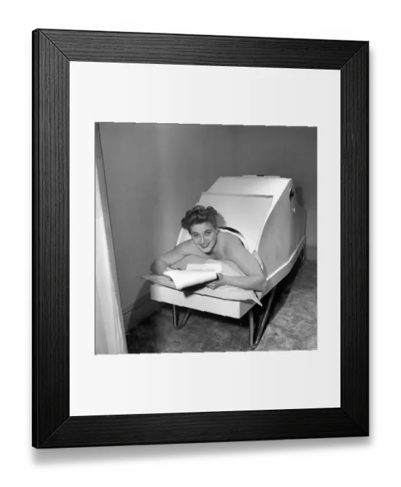 Framed Print : Actress Hy Hazel relaxes as she studies her part as Principal Boy in the Puss in Boots Framed Print : Actress Hy Hazel relaxes as she studies her part as Principal Boy in the Puss in Boots