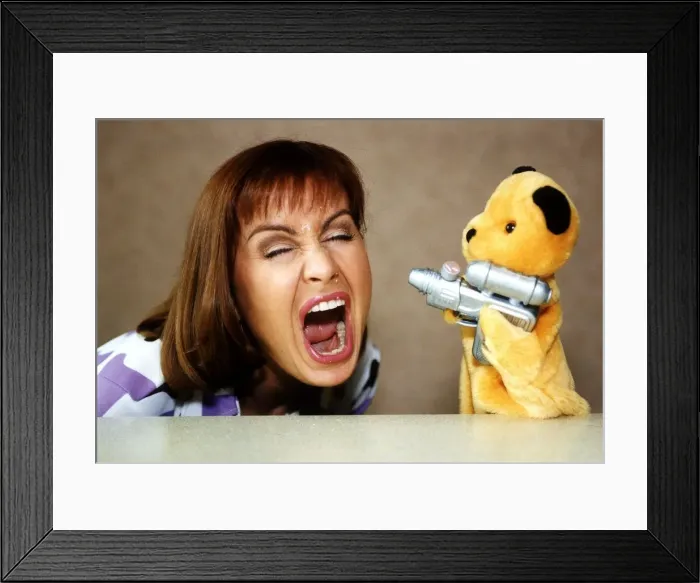 Framed Print : Sooty and Television Presenter Sian Lloyd June 1997 Celebrating Sooty Framed Print : Sooty and Television Presenter Sian Lloyd June 1997 Celebrating Sooty