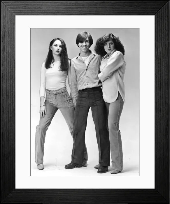 Framed Print : Three young models sporting the latest in cordoroy trousers