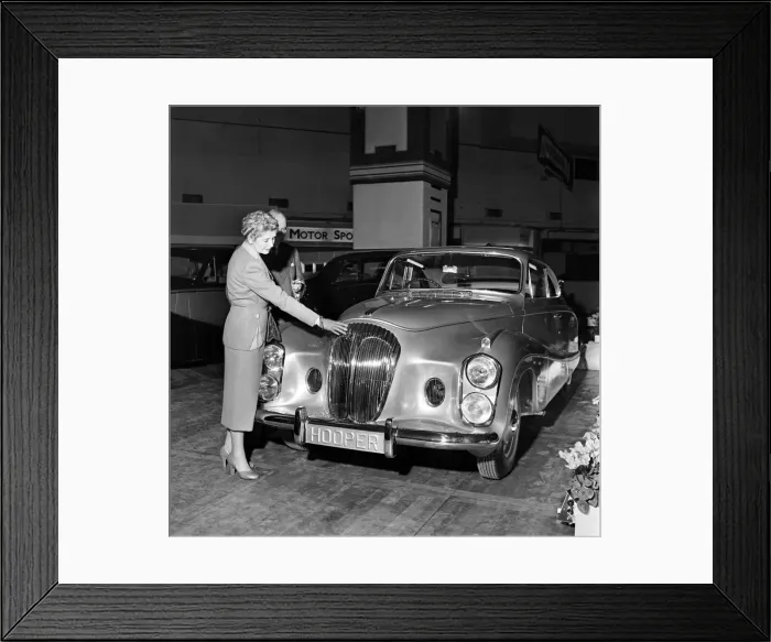 Framed Print : Motor Show: Sir Bernard and Lady Docker photographed beside their new Framed Print : Motor Show: Sir Bernard and Lady Docker photographed beside their new