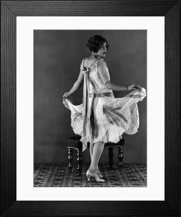 Framed Print : Clothing. White chiffon debutantes dress with petal shaped skirt embroidered with Framed Print : Clothing. White chiffon debutantes dress with petal shaped skirt embroidered with