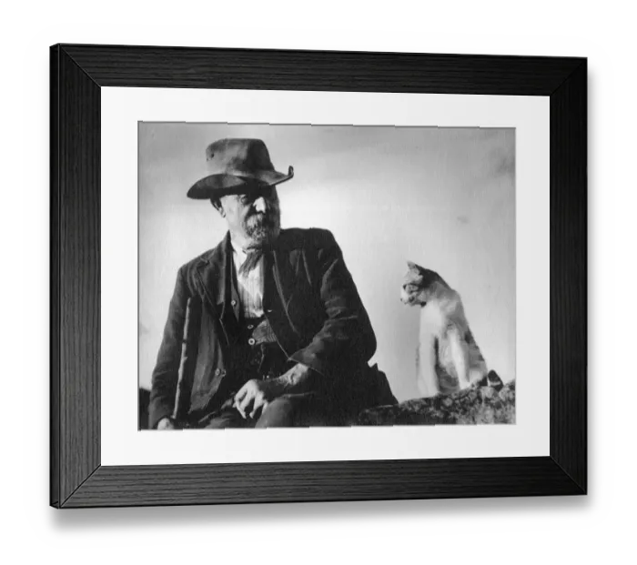 Framed Print : Character Studies. Man sitting on wall with cat next to him