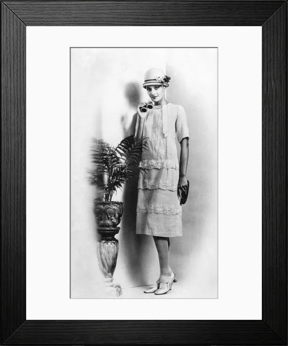 Framed Print : One of the runabout dresses of 28 worn with the classic cloche straw hat of that Framed Print : One of the runabout dresses of 28 worn with the classic cloche straw hat of that