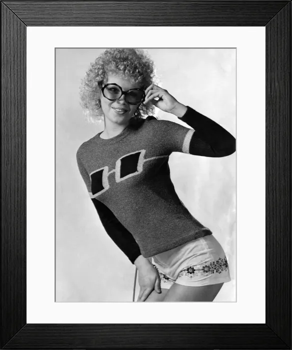 Framed Print : The sweater has never looked so good. Guaranteed to get more than a second glance is this Framed Print : The sweater has never looked so good. Guaranteed to get more than a second glance is this