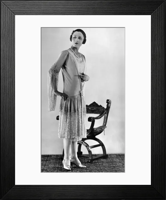 Framed Print : Clothing. This very pleasing evening gown is of pale cyclamen georgette and lace Framed Print : Clothing. This very pleasing evening gown is of pale cyclamen georgette and lace