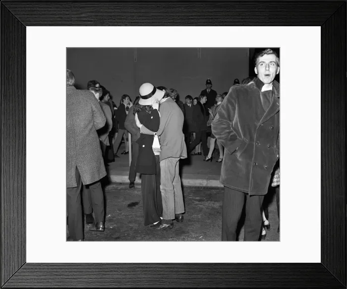 Framed Print : A couple kiss to celebrate New Year in Manchester. December 1969 Z12558-002