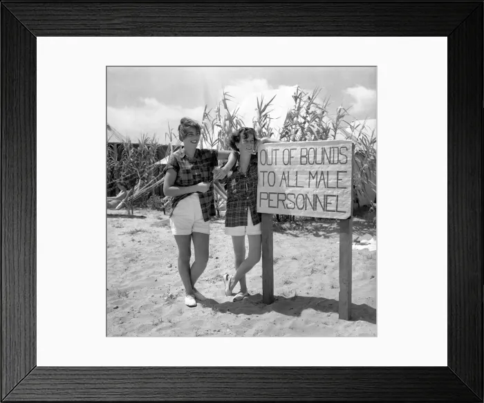 Framed Print : Cyprus: Army Leave Camp. Women service personnel seen here by a sign marking out