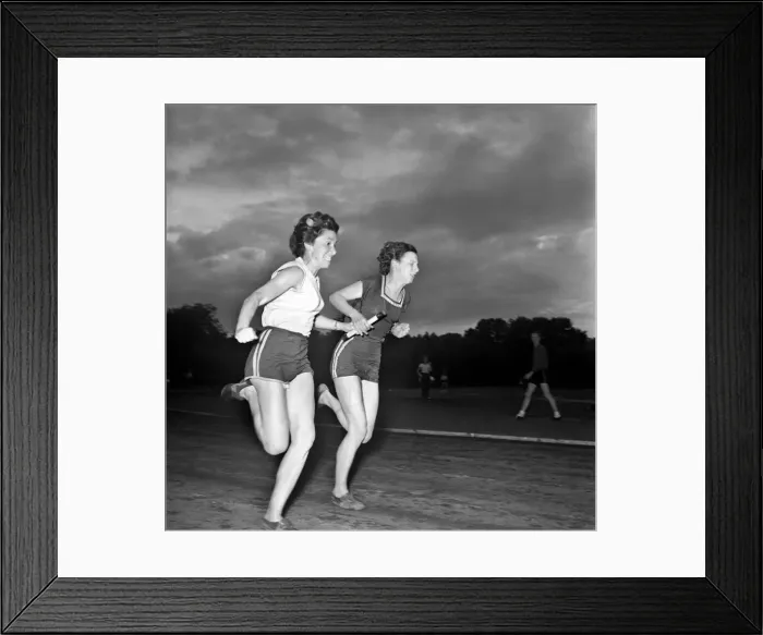 Framed Print : Sport Athletics: Jean, farthest from camera, taking the baton from Jean Foulds in a