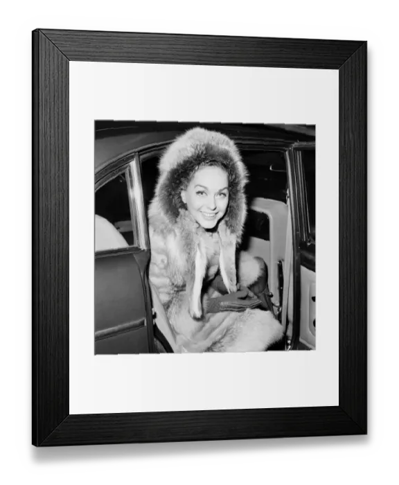 Framed Print : Film Actor David Niven, and his wife Hjordis arrived in London from Geneva today