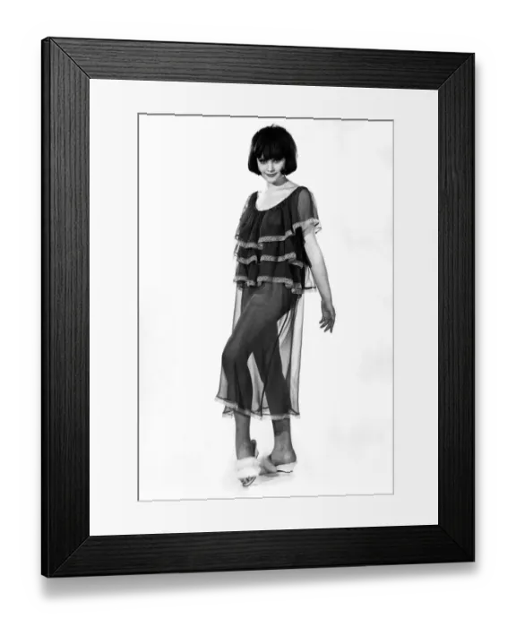 Framed Print : Woman wearing short sleeved see through top with leg warmers July 1963 P009020