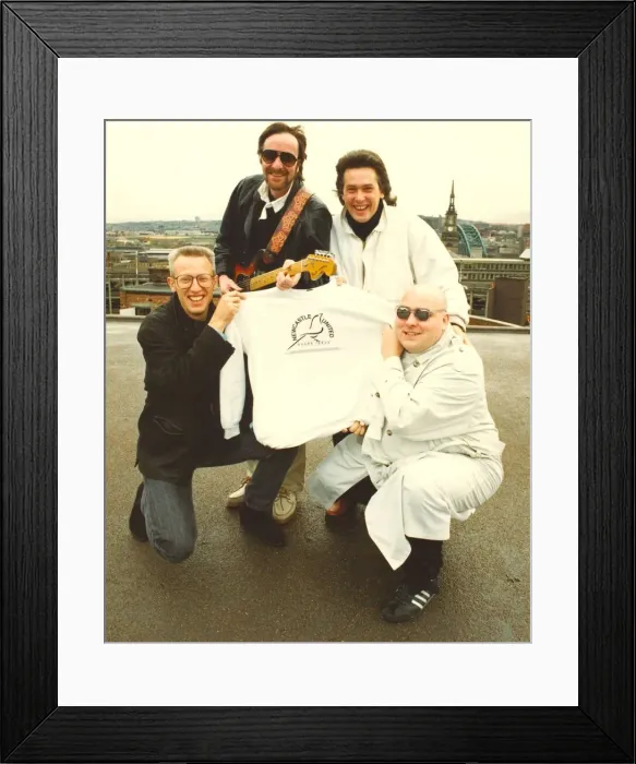 Framed Print : Lindisfarne members with a Newcastle United share issue t-shirt. 07 / 11 / 90 Framed Print : Lindisfarne members with a Newcastle United share issue t-shirt. 07 / 11 / 90
