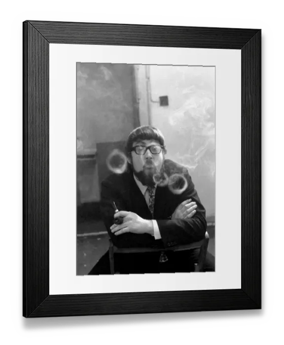 Framed Print : A man smoking a cigarette blowing smoke rings. November 1969 Z12004-002 Framed Print : A man smoking a cigarette blowing smoke rings. November 1969 Z12004-002