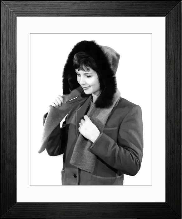 Framed Print : Model Ann Cave wearing a winter jacket with fur lined hood