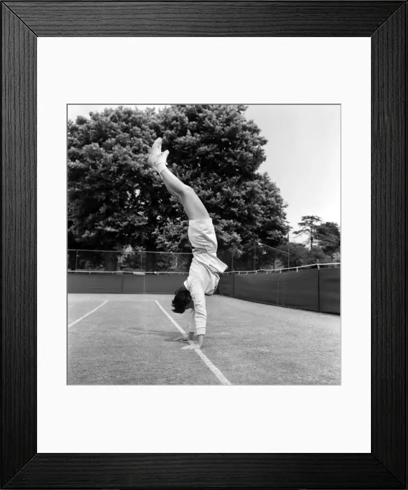 Framed Print : Lawn Tennis at Beckenham. Woman training before a match at the club June Framed Print : Lawn Tennis at Beckenham. Woman training before a match at the club June