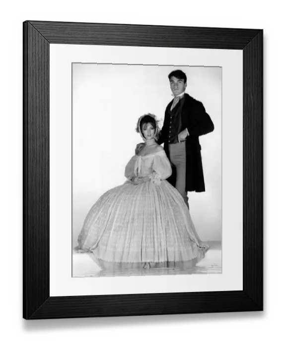 Framed Print : Covering Up... with the Victorians. Man and woman dressed in Victorian style clothing Framed Print : Covering Up... with the Victorians. Man and woman dressed in Victorian style clothing