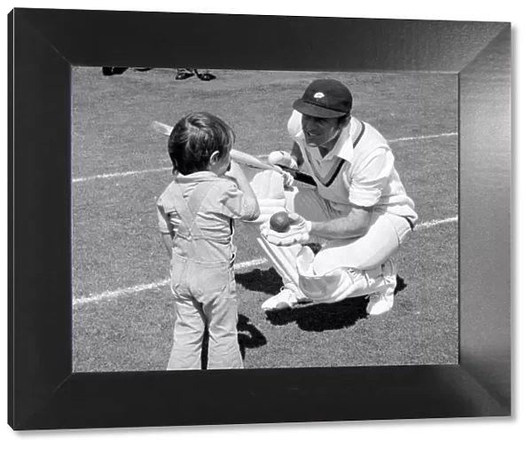 Yorkshire and England cricketer Geoffrey Boycott holding a bat