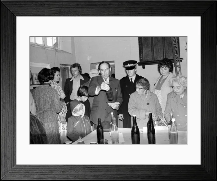 Framed Print : Liberal Party leader Jeremy Thorpe looking at bottles as he visits a flower show Framed Print : Liberal Party leader Jeremy Thorpe looking at bottles as he visits a flower show