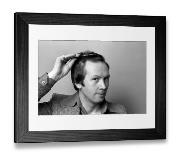 Framed Print : Man combing his hair. July 1975 75-00177-002