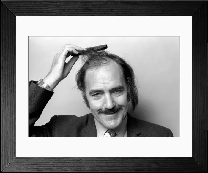 Framed Print : Man combing his hair. July 1975 75-00177 Framed Print : Man combing his hair. July 1975 75-00177