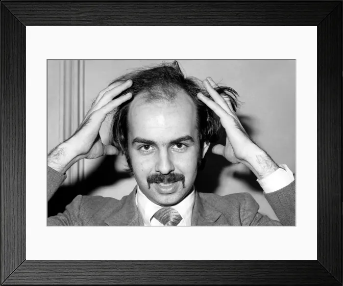 Framed Print : Man combing his hair. July 1975 75-00177-001 Framed Print : Man combing his hair. July 1975 75-00177-001